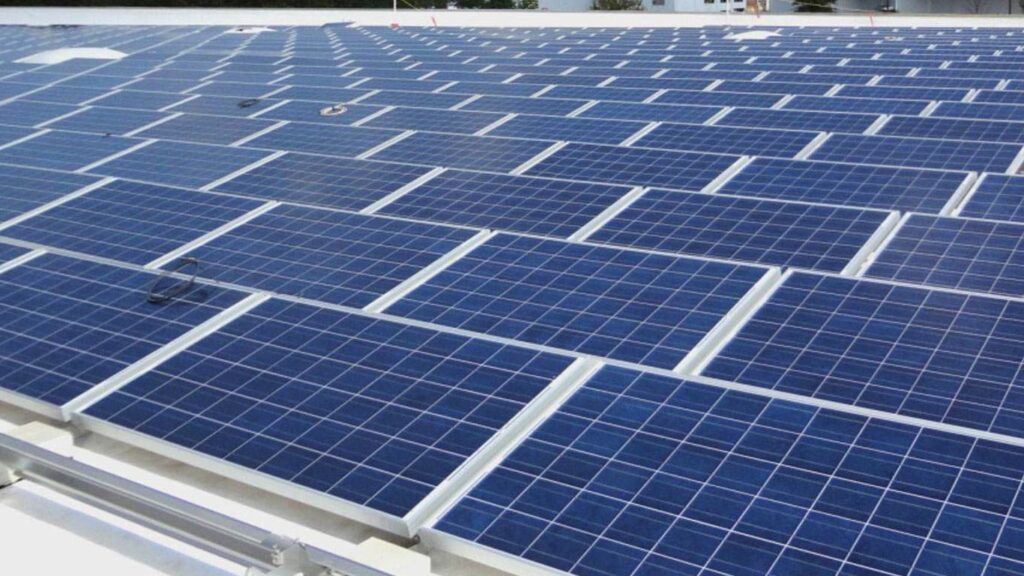 Rooftop commercial solar panel array on an office/warehouse building